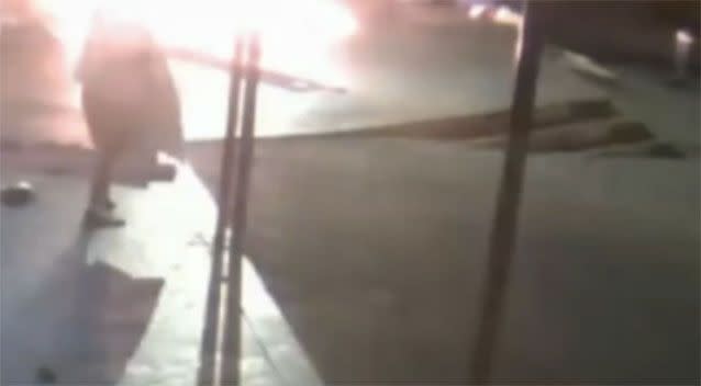 Figures are seen on the CCTV running away from the scene. Photo: NSW Police