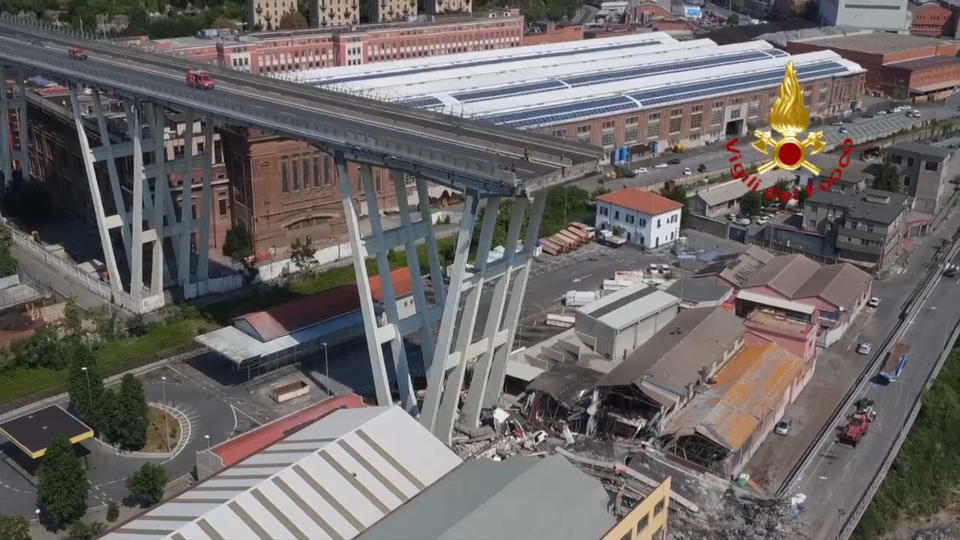 In this frame taken from a video released by the Vigili del Fuoco (Firefighters), an aerial view of the collapsed Morandi highway bridge, in Genoa, Saturday, Aug. 18, 2018. Saturday has been declared a national day of mourning in Italy and includes a state funeral at the industrial port city's fair grounds for those who plunged to their deaths as the 45-meter (150-foot) tall Morandi Bridge gave way Tuesday. (Vigil del Fuoco via AP)