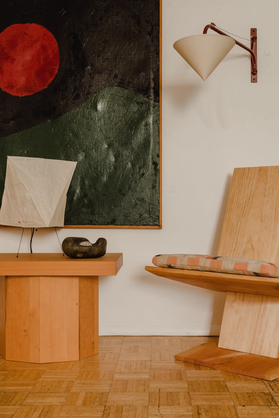 “Older reproductions are interesting,” says Jonny of this swing-arm lamp which he calls a Jean Prouvé knockoff. “They made reproductions of them in the 1960s. I think someone just saw it and was like, ‘I’m going to make that.’ Shown here with Jonny’s own Douglas fir chair and an Akari lamp by Isamu Noguchi.