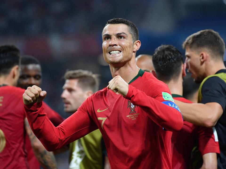 <p>(Almost) winners are grinners: Ronaldo is all smiles after scoring his stunning free kick to complete his hat-trick. (AP) </p>