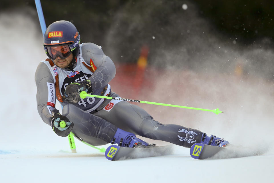 Slovakia's Andreas Zampa speeds down the course during a men's World Cup Giant Slalom, in Alta Badia, Italy, Sunday, Dec. 16, 2018. (AP Photo/Marco Trovati)