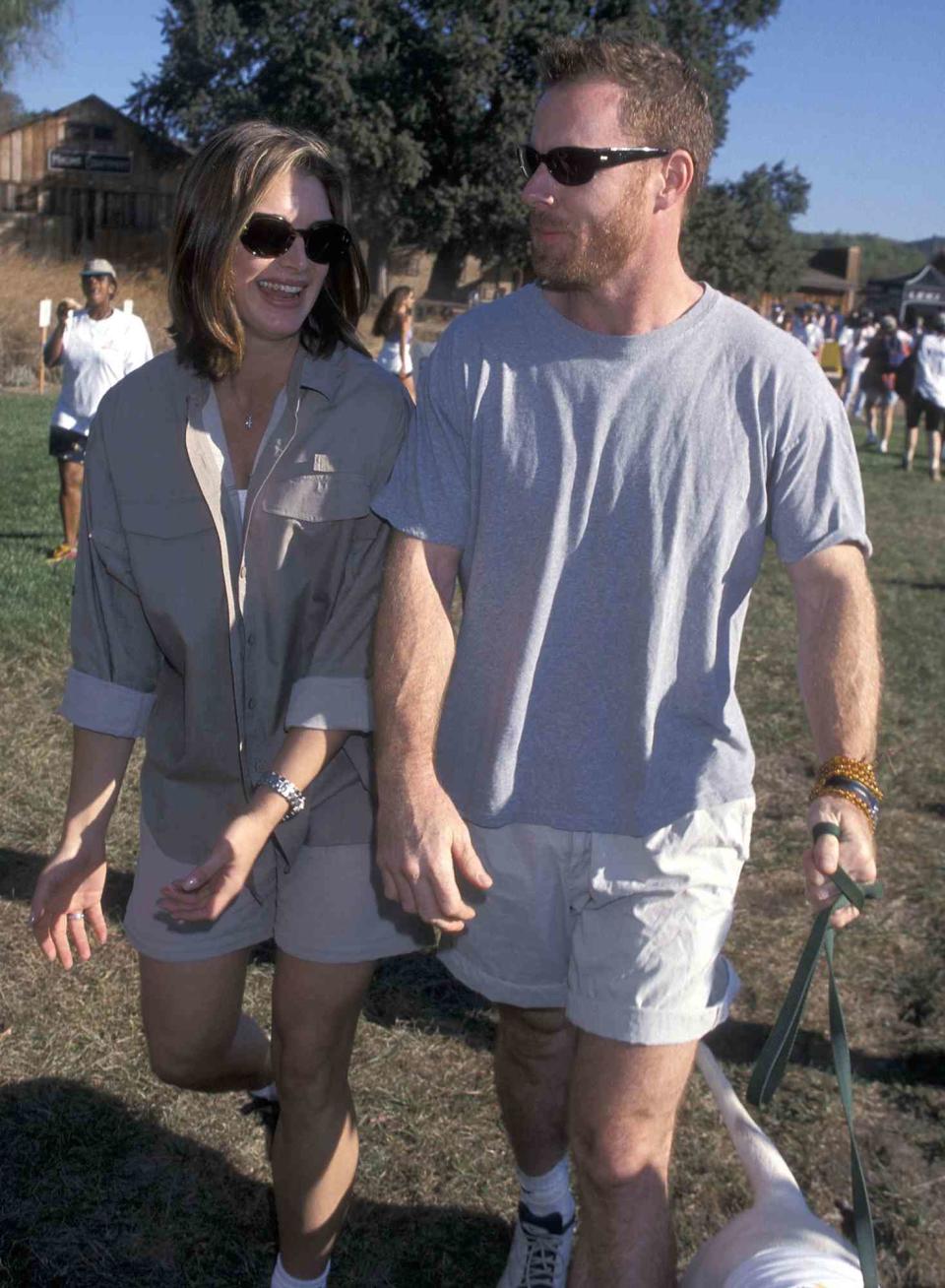 Brooke Shields and boyfriend Chris Henchy attend the Fourth Annual Expedition Inspiration Take-A-Hike and Cross-Country-Fun-Run for Breast Cancer Research on October 9, 1999 at Paramount Ranch in Agoura Hills, California