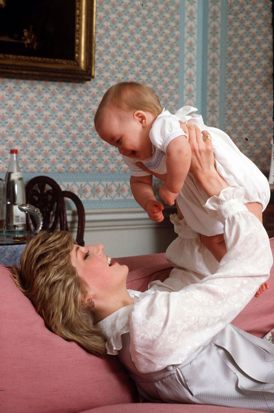<p>The princess plays with Prince William at Kensington Palace in 1983. </p>