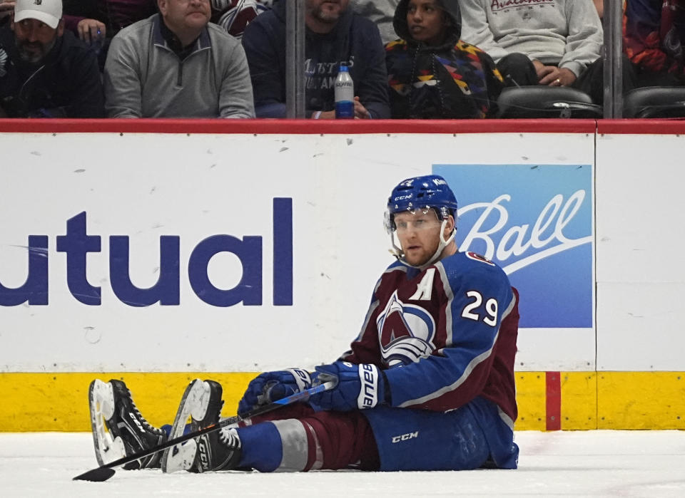 Colorado Avalanche center Nathan MacKinnon reacts after Dallas Stars center Matt Duchene scored the winning goal in the second overtime of Game 6 of an NHL hockey playoff series Friday, May 17, 2024, in Denver. (AP Photo/David Zalubowski)