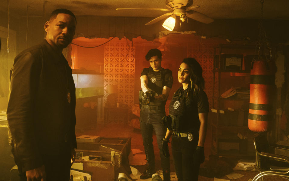 This image released by Sony Pictures shows Will Smith, from left, Charles Melton and Vanessa Hudgens in a scene from "Bad Boys for Life." (Columbia Pictures-Sony via AP)