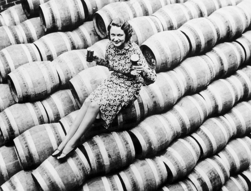 Woman on Beer Barrels