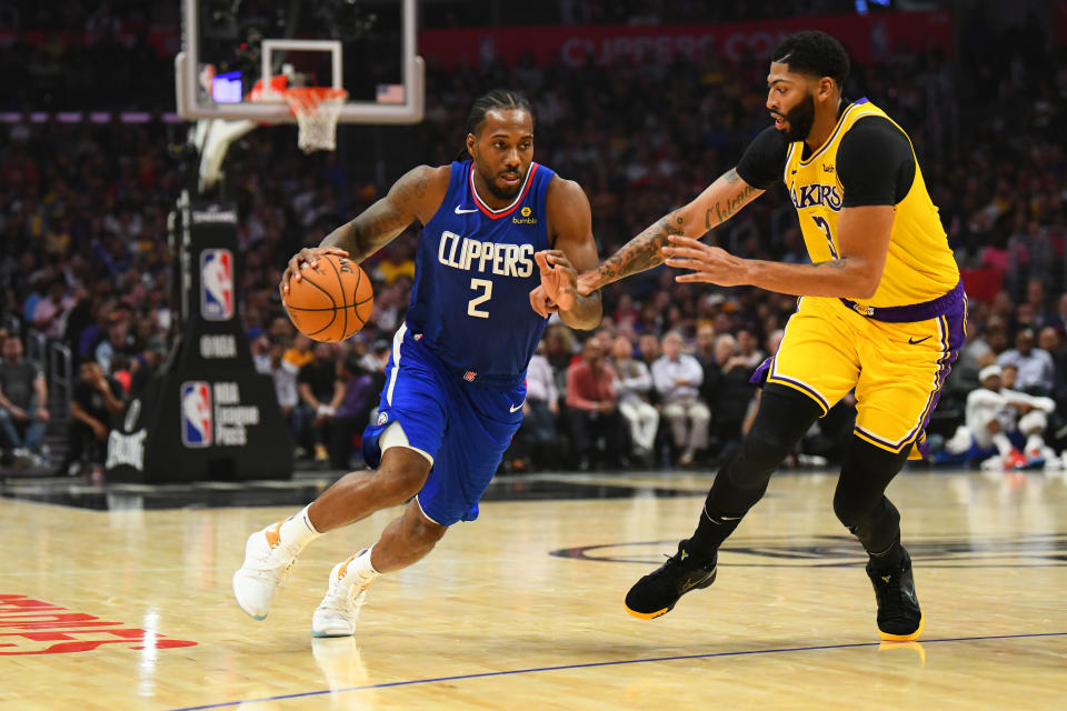 Kawhi Leonard, taking Anthony Davis off the dribble, was the best player on the court Tuesday night. (Photo by Brian Rothmuller/Icon Sportswire via Getty Images)