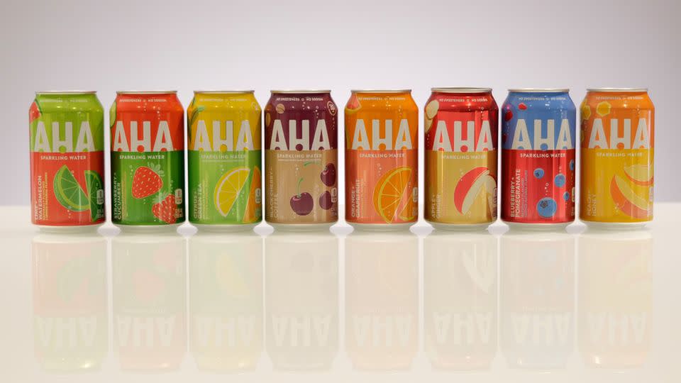 Coca-Cola launched Aha, a new flavored seltzer water brand with a splash of caffeine, in 2019. - Coca-Cola