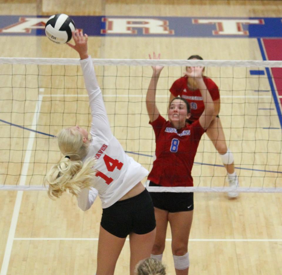 Indian Creek sophomore Faith Wiseman gets a kill on the outside corner during Tuesday's game at Martinsville.