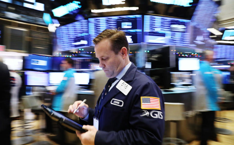 A trader works on the floor at the New York Stock Exchange (NYSE) in New York City, U.S., November 30, 2018. REUTERS/Brendan McDermid