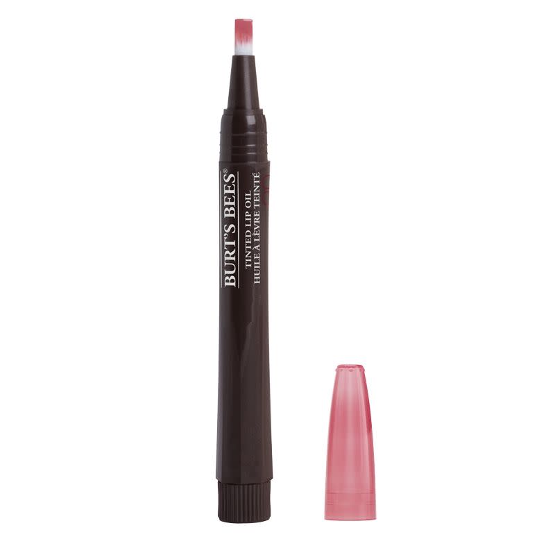 <p>This lip oil is the perfect gift for the natural beauty lover who’s into lip gloss but not its sticky residue. <a rel="nofollow noopener" href="http://www.burtsbees.com/product/tinted-lip-oil--coming-soon/VM-792850898080.html" target="_blank" data-ylk="slk:Burt's Bees Tinted Lip Oil;elm:context_link;itc:0;sec:content-canvas" class="link ">Burt's Bees Tinted Lip Oil</a>, $9. (Photo: Burt's Bees) </p>