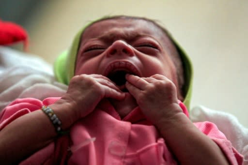 An infant suffering from malnutrition in a hospital in Yemen: a UN report said that 821 million people suffered from hunger, food insecurity and malnutrition in 2018