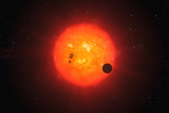 An artist's impression of an exoplanet transiting a red dwarf star in the same way as the newfound, Earth-size exoplanet GJ 1132b does.