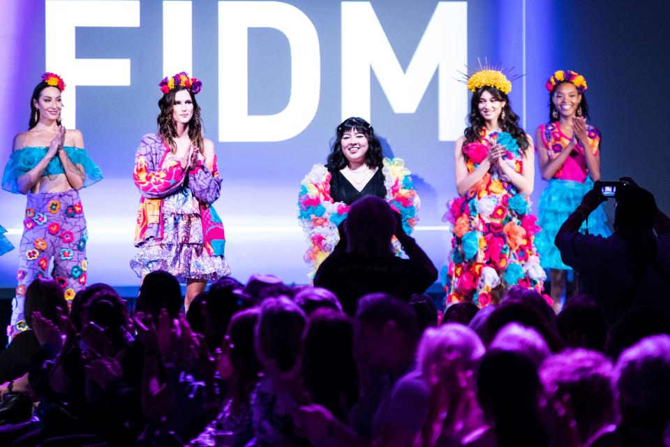 Models debut a fashion collection from Sofia Masuda, center, a recent graduate of the Fashion Institute of Design and Merchandising, during Fashion Week El Paseo on Thursday, March 24, 2022. 