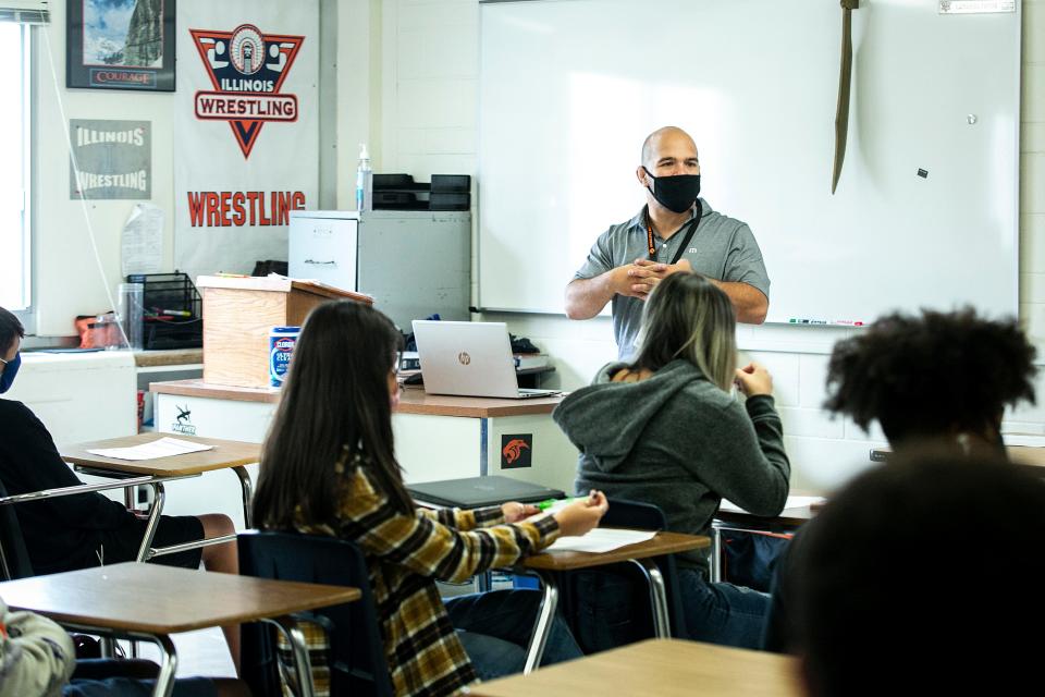 Lambros Fotos teaches a history class, Friday, Aug. 6, 2021, at United Township High School in East Moline, Ill.