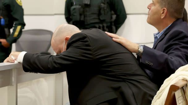 PHOTO: Ilan Alhadeff is comforted as he returns to his seat after giving his victim impact statement at the Broward County Courthouse in Fort Lauderdale, Fla., Aug. 2, 2022 (Amy Beth Bennett/AP)