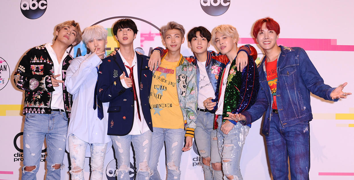 The management company behind the ultra-popular K-pop band apologized after a week of controversy. (Photo: Jason LaVeris via Getty Images)