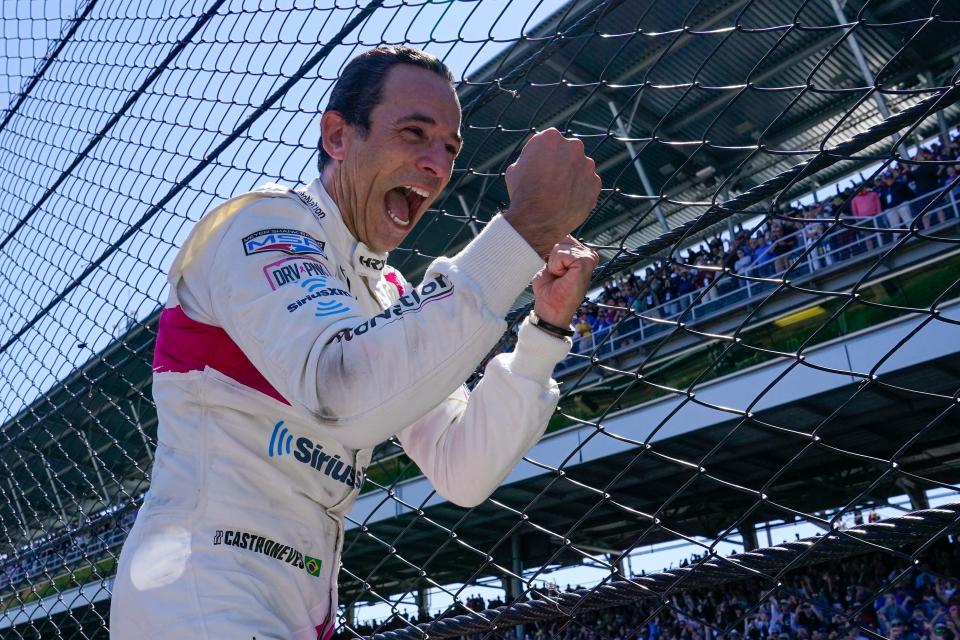 Helio Castroneves celebrates his victory in the 2021 Indianapolis 500, which made him the fourth four-time winner.