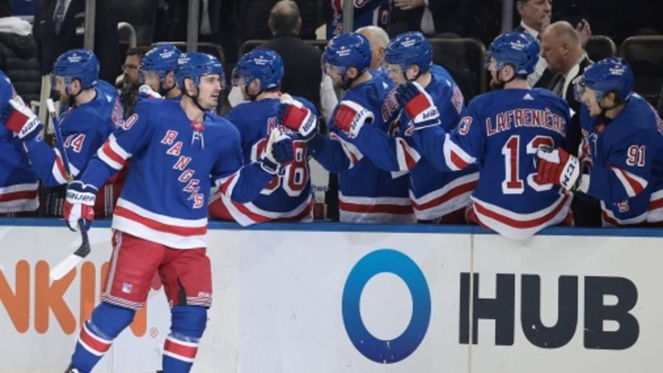 New York Rangers left wing Chris Kreider (20) celebrates his goal with teammates during the third period against the Pittsburgh Penguins at Madison Square Garden.