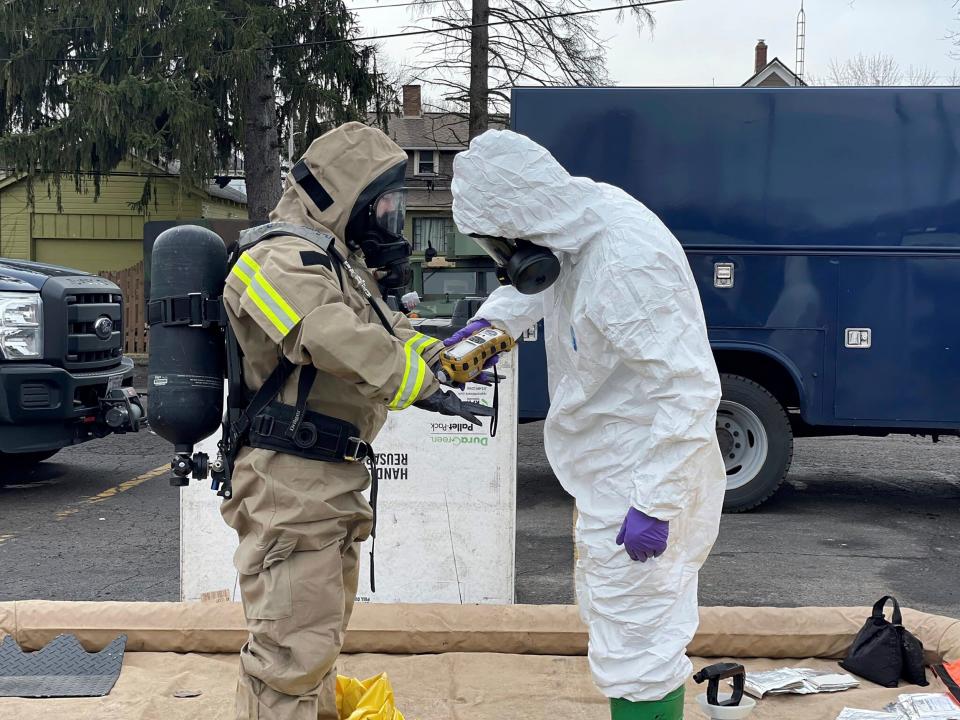 This photo provided by the Ohio National Guard, ONG 52nd Civil Support Team members prepare to enter an incident area to assess remaining hazards with a lightweight inflatable decontamination system (LIDS) in East Palestine, Ohio, Tuesday, Feb. 7, 2023.