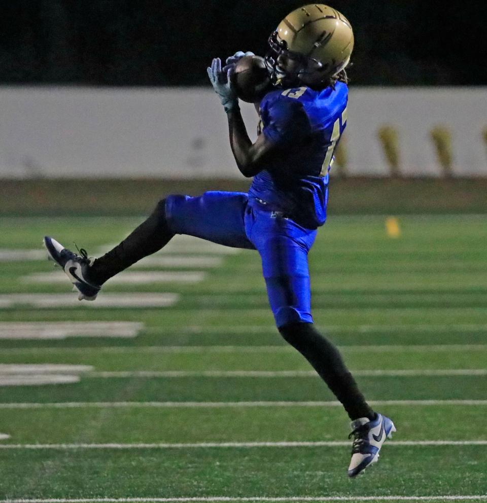 Mainland’s Marquis McCants (13) catches the ball during a playoff game against the Satellite Scorpions, Friday, Nov. 10, 2023 at Daytona Stadium.