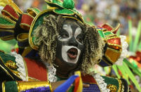 <p>A reveller from Grande Rio Samba school performs during the first night of the Carnival parade at the Sambadrome in Rio de Janeiro, Brazil, Feb. 12, 2018. (Photo: Ricardo Moraes/Reuters) </p>