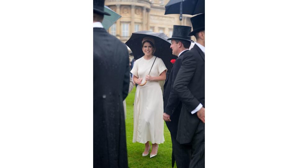 Princess Eugenie wearing white satin dress at garden party