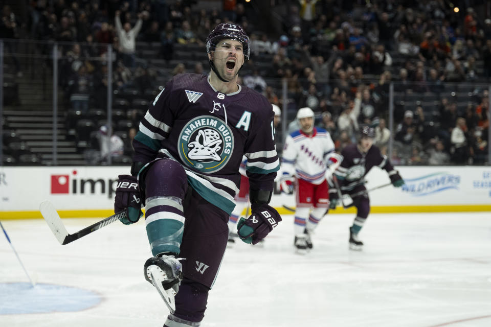 Anaheim Ducks center Adam Henrique (14) celebrates his goal during the first period of an NHL hockey game against the New York Rangers, Sunday, Jan. 21, 2024, in Anaheim, Calif. (AP Photo/Kyusung Gong)