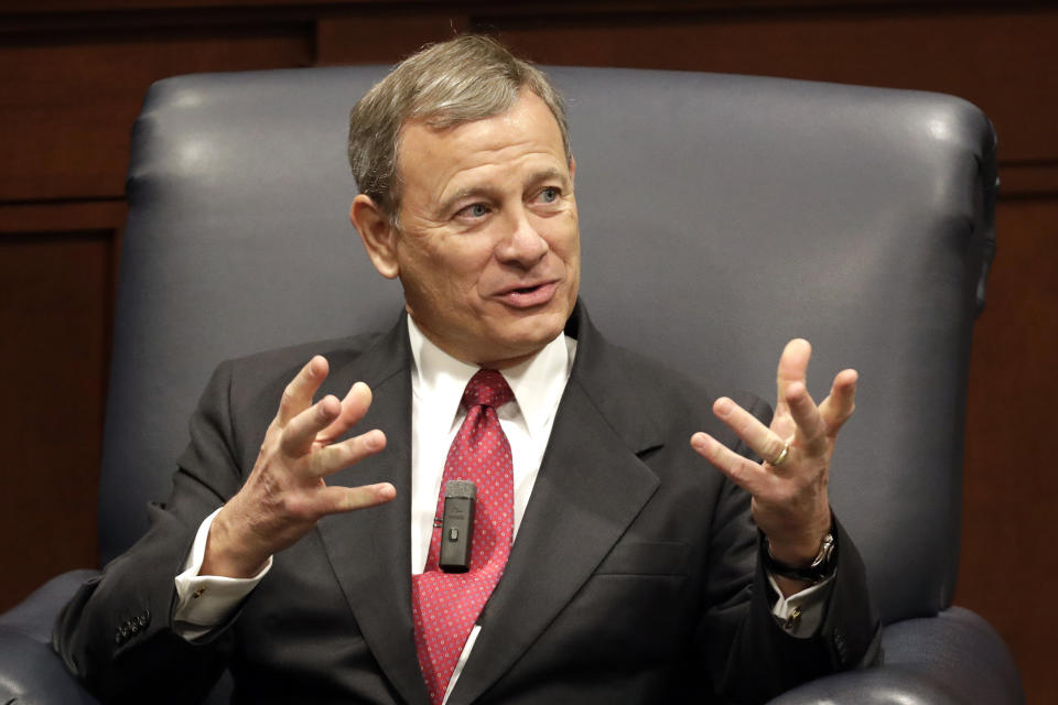 FILE - In this Feb. 6, 2019 file photo, Supreme Court Chief Justice John Roberts answers questions during an appearance at Belmont University in Nashville, Tenn. U.S. Chief Justice John Roberts, a pick of former President George W. Bush, has endured GOP anger over decisions ranging from immigration to pandemic restrictions on church gatherings. Roberts has pushed back, warning that political polarization is skewing how people view the judicial branch. (AP Photo/Mark Humphrey, File)