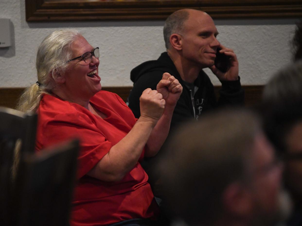 District 3 School Board incumbent Debbie Gaugh cheers as her son Glen is projected to win the Republican primary for District 2 during the Constitutional Republicans March 5 Election watch party inside Mulligan's in Jackson, Tenn. on Tuesday, March 5, 2024.