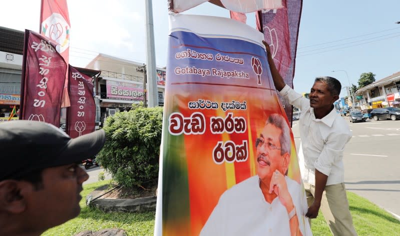 Supporters of Sri Lanka People's Front party presidential election candidate Gotabaya Rajapaksa celebrate after he won the presidential election in Colombo