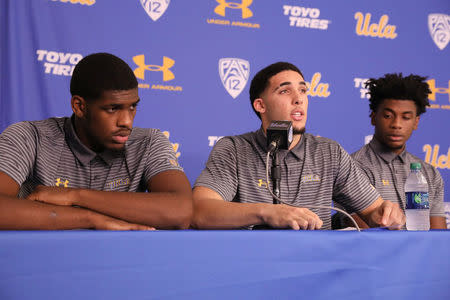 UCLA basketball players Cody Riley, LiAngelo Ball, and Jalen Hill speak at a press conference at UCLA after flying back from China where they were detained on suspicion of shoplifting, in Los Angeles, California, U.S., November 15, 2017. REUTERS/Lucy Nicholson