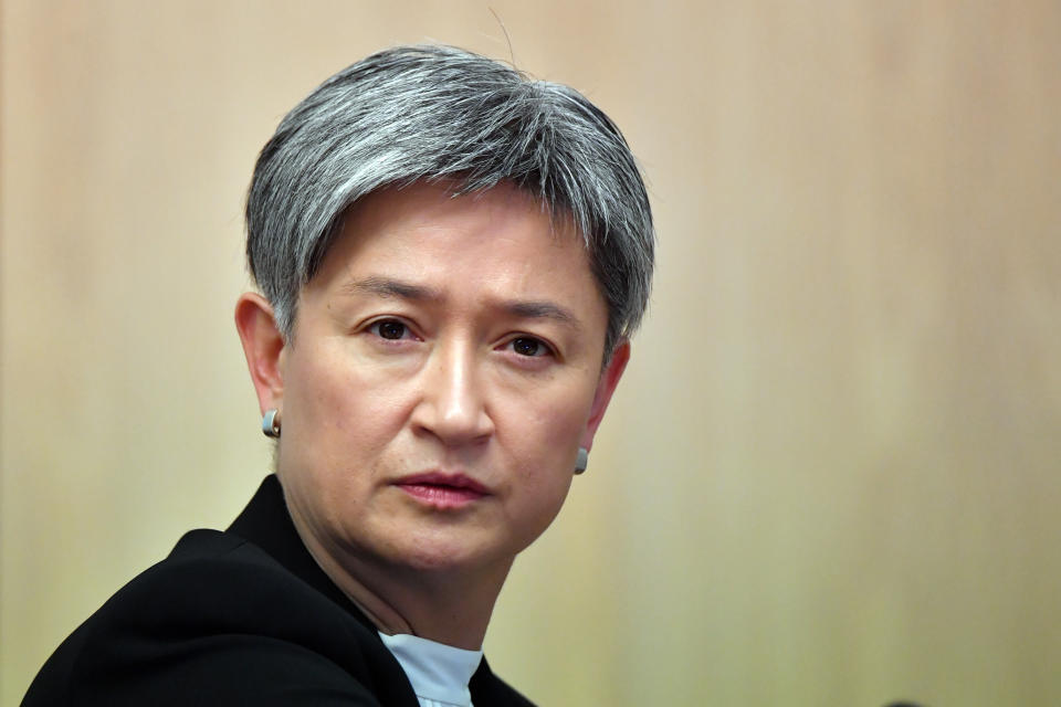 CANBERRA, AUSTRALIA - MARCH 22: Senator Penny Wong reacts to Senator Scott Ryan as he appears before the Additional Estimates 2020–21 Finance and Public Administration Legislation Committee in the Main Committee Room at Parliament House on March 22, 2021 in Canberra, Australia. Australian Federal Police Commissioner Reece Kershaw has warned the Prime Minister’s probe into who knew what and when on the alleged rape of Brittany Higgins could interfere with the police investigation raising the prospect the political probe could be suspended. .  (Photo by Sam Mooy/Getty Images)