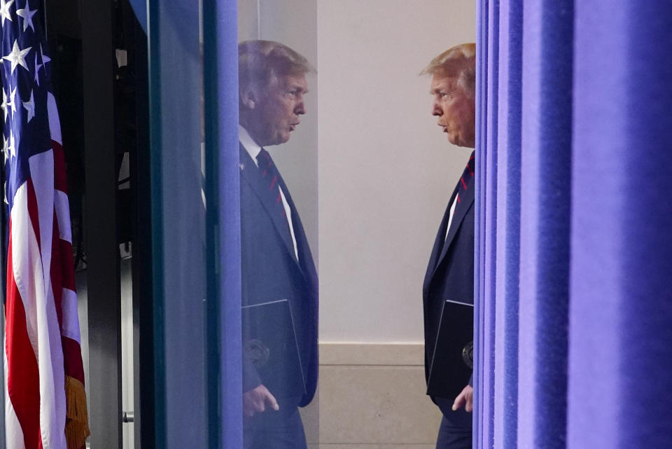 President Donald Trump arrives for a news conference at the White House, Tuesday, July 21, 2020, in Washington. (AP Photo/Evan Vucci)