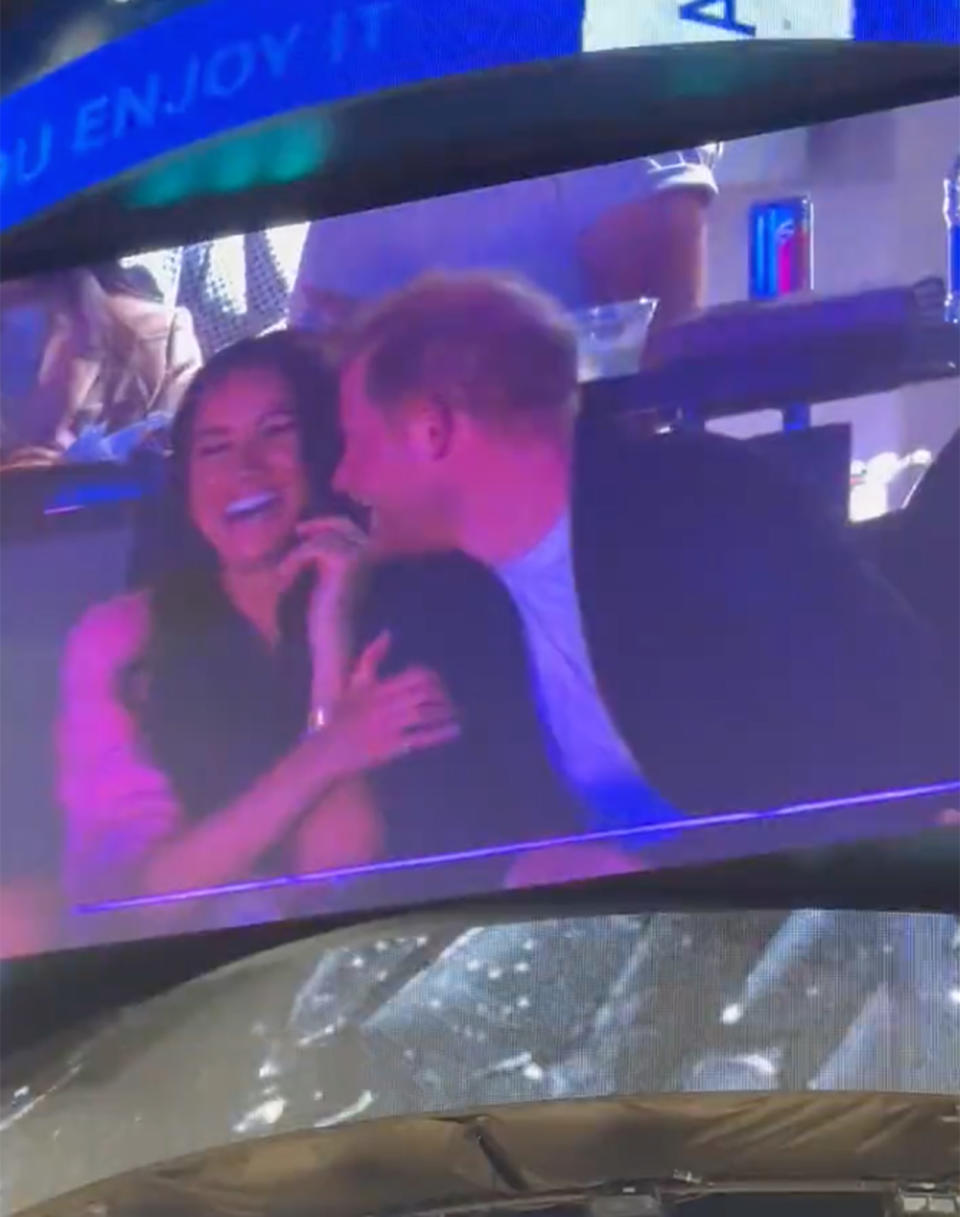 Meghan Markle laughing at Prince Harry