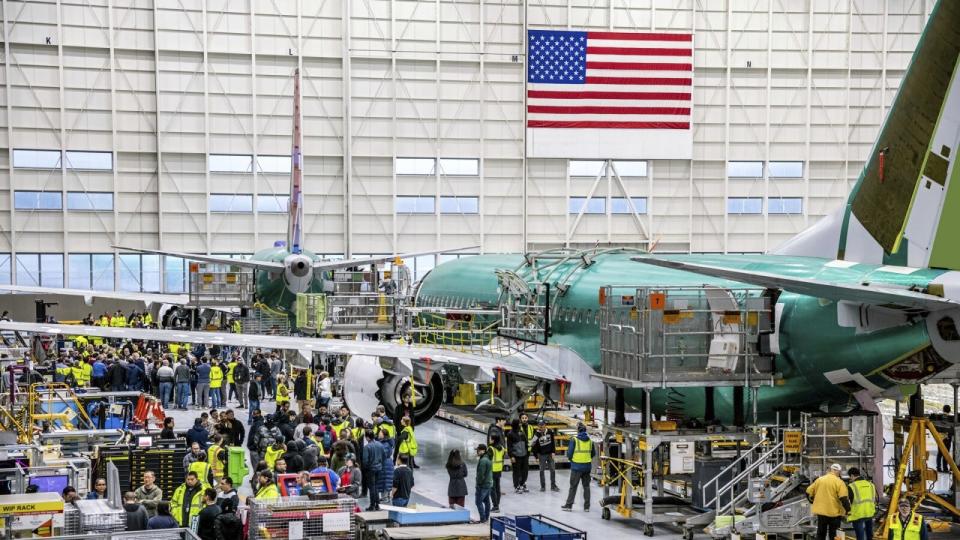 Boeing employees listen to Stan Deal, Boeing Commercial Airplanes President and CEO and other employees in Renton, Wash., on Thursday, Jan. 25, 2024. Alaska Airlines has begun flying Boeing 737 Max 9 jetliners again, Friday, Jan. 26, for the first time since they were grounded after a panel blew out of the side of one of the airline's planes.(Boeing via AP)