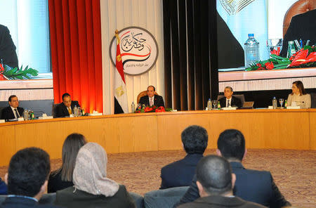 Egyptian President Abdel Fattah Al Sisi (C) attends with his government during the "Tale of a Homeland" conference in Cairo about dialogue with citizens to review the achievements made during his four-year tenure, Egypt, January 18, 2018 in this handout picture courtesy of the Egyptian Presidency. The Egyptian Presidency/Handout via REUTERS