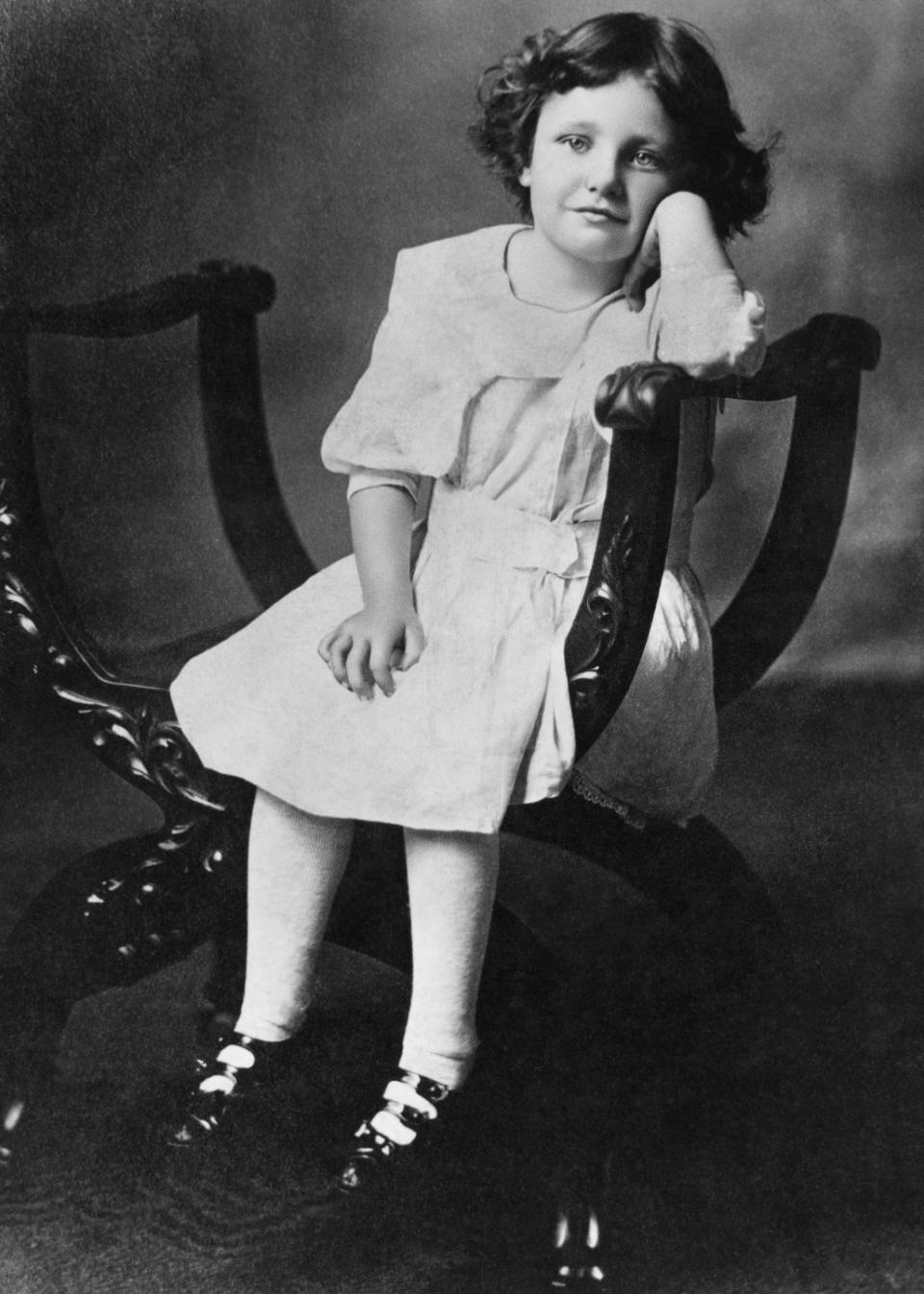 1911: Smiling for the camera as a child