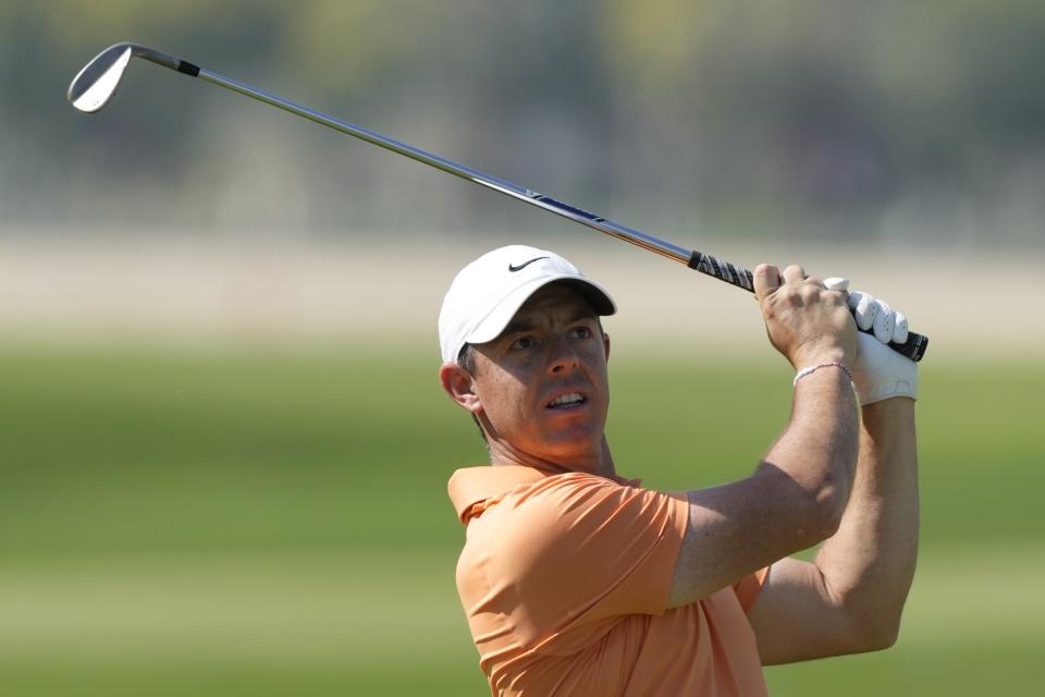 Rory McIlroy of Northern Ireland plays his second shot on the 1st hole during the final round of Dubai Invitational golf tournament, in Dubai, United Arab Emirates, Sunday, Jan. 14, 2024. (AP Photo/Kamran Jebreili)