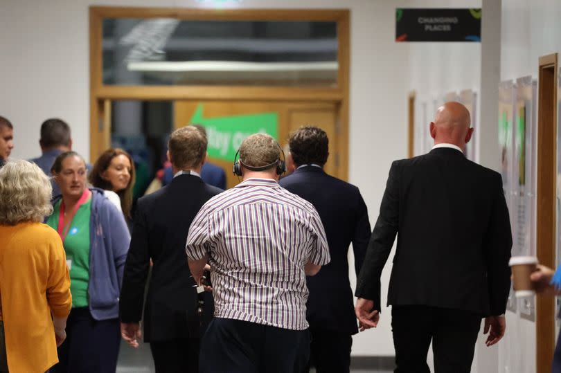 Johnny Mercer, his wife Felicity and entourage, leave the Plymouth election count moments after his defeat is confirmed