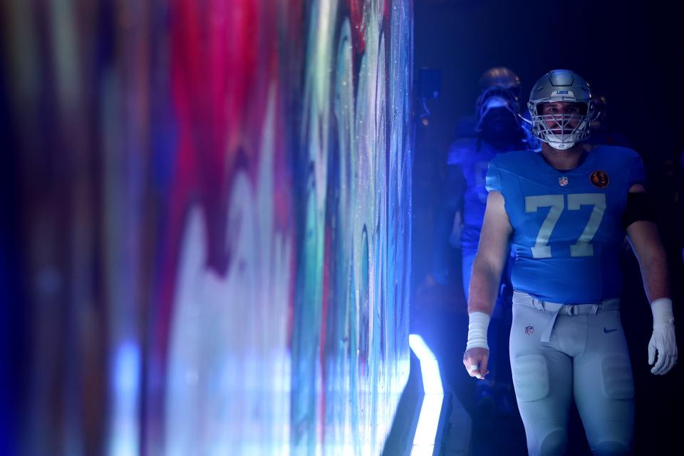 Detroit Lions center Frank Ragnow walks through the tunnel and prepares to take the field prior to a Thanksgiving Day game against the Green Bay Packers at Ford Field on Nov. 23, 2023 in Detroit.