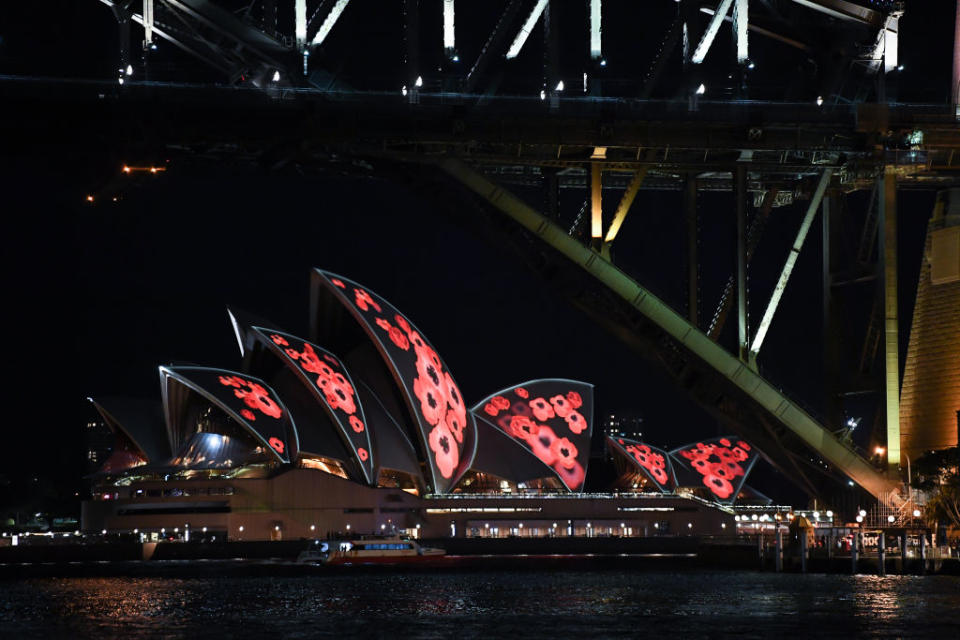 <p>Poppies are projected onto the sails of the Sydney Opera House with the foreground of the Harbour Bridge on Nov. 11, 2018 in Sydney, Australia. Remembrance Day 2018 marks the centenary anniversary of the Armistice that ended the First World War on Nov. 11, 1918. Almost 62,000 Australians died fighting in four years of global conflict. On this day Australians observe one minute’s silence at 11 a.m. to honour those who have served and those who have died in war and on peacekeeping and humanitarian operations. (Photo from James D. Morgan/Getty Images) </p>