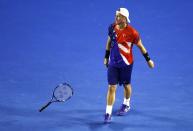 Australia's Lleyton Hewitt throws his racquet during his second round match against Spain's David Ferrer at the Australian Open tennis tournament at Melbourne Park, Australia, January 21, 2016. REUTERS/Jason O'Brien