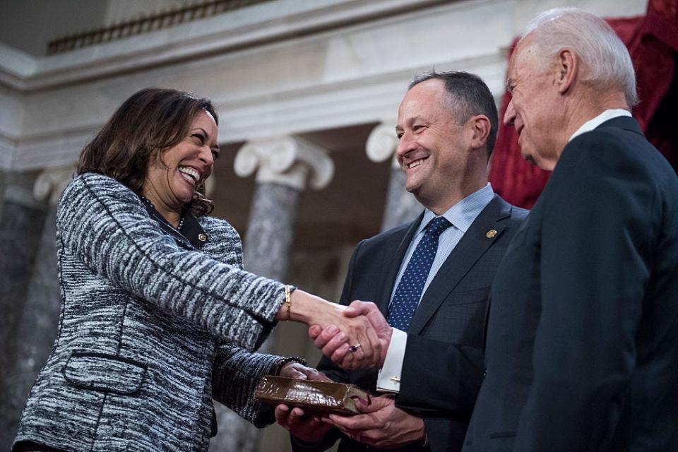 Vice President Joe Biden administers the oath at Kamala Harris' swearing-in ceremony in the Capitol's Old Senate Chamber in 2017.