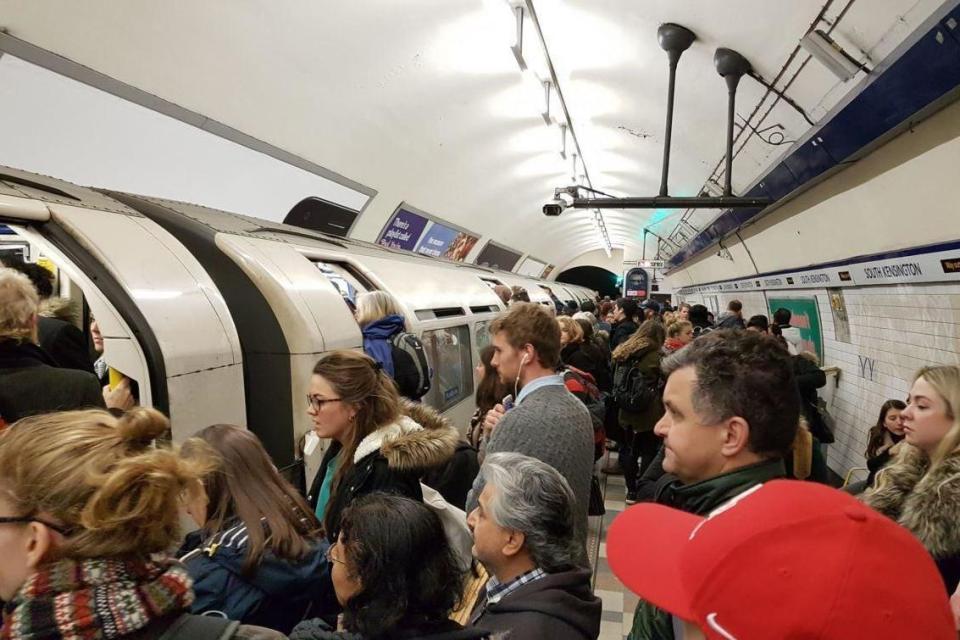 Commuter chaos: Commuters wait to board a packed train on the Piccadilly line (file photo): @rhsteoh