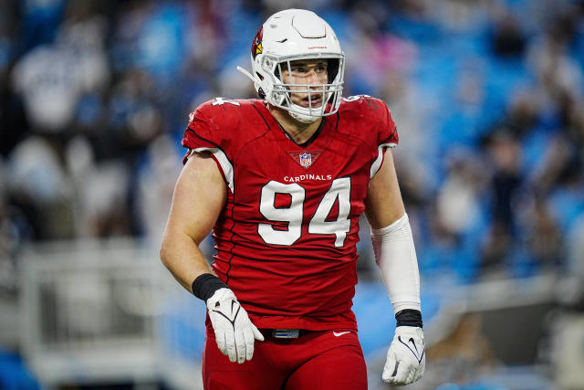 Arizona Cardinals defensive end Zach Allen (94) exits the field during an NFL football game against the Carolina Panthers on Sunday, Oct. 02, 2022, in Charlotte, N.C. (AP Photo/Rusty Jones)