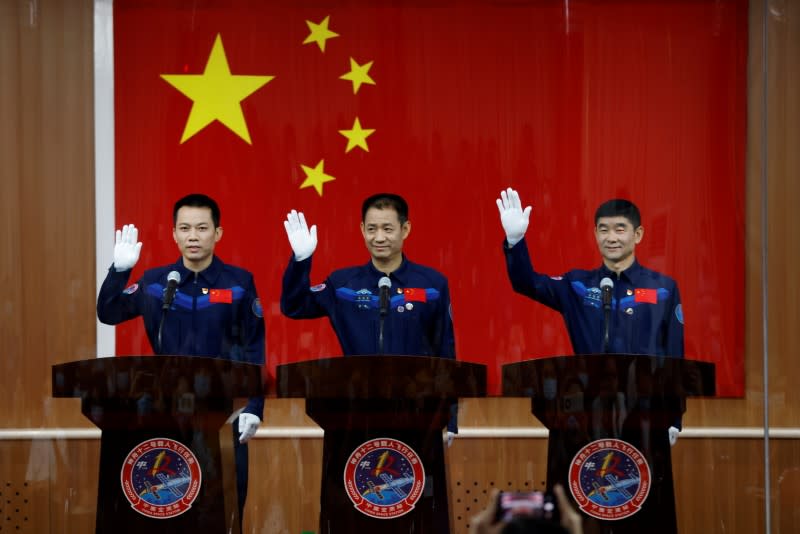 Chinese astronauts meet members of the media at Jiuquan Satellite Launch Center