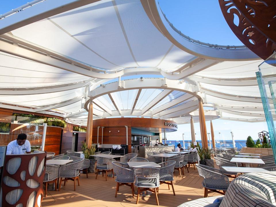 Rooftop Garden Grill under a white awning