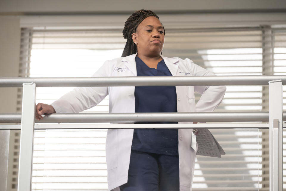 Miranda Bailey looking down from a balcony in the hospital on Grey's Anatomy