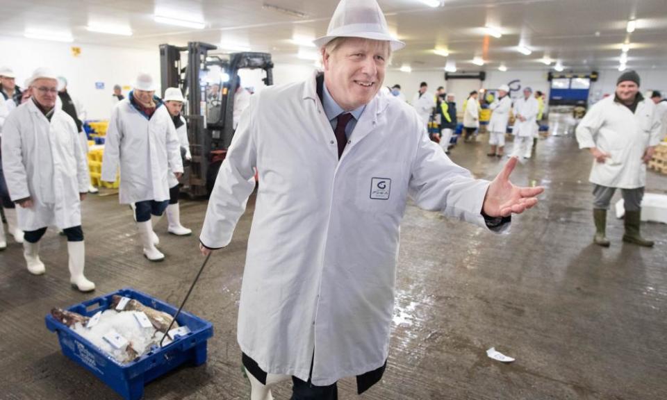 Boris Johnson campaigns at Grimsby fish market during the election.